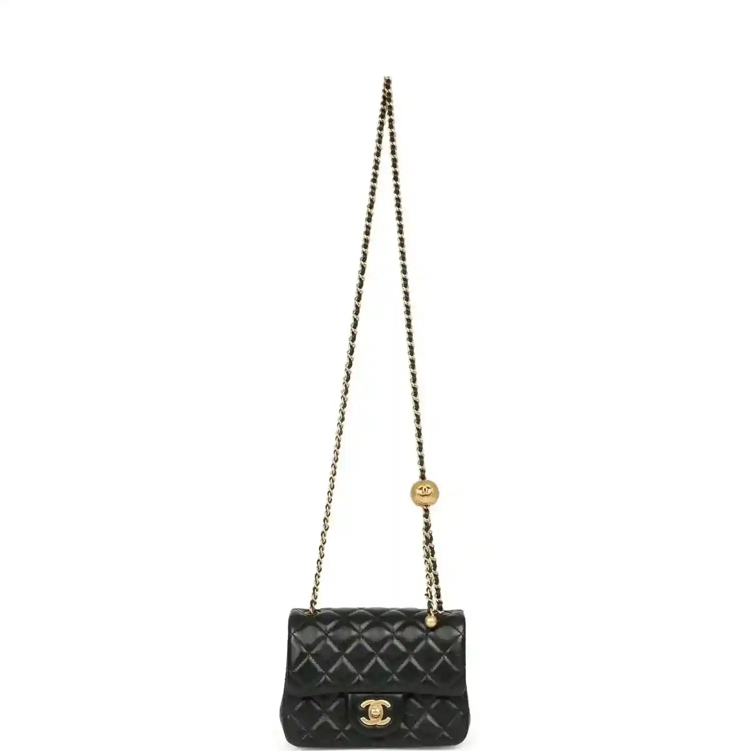 Black mini flap bag on gold chain with quilted front and CC emblem