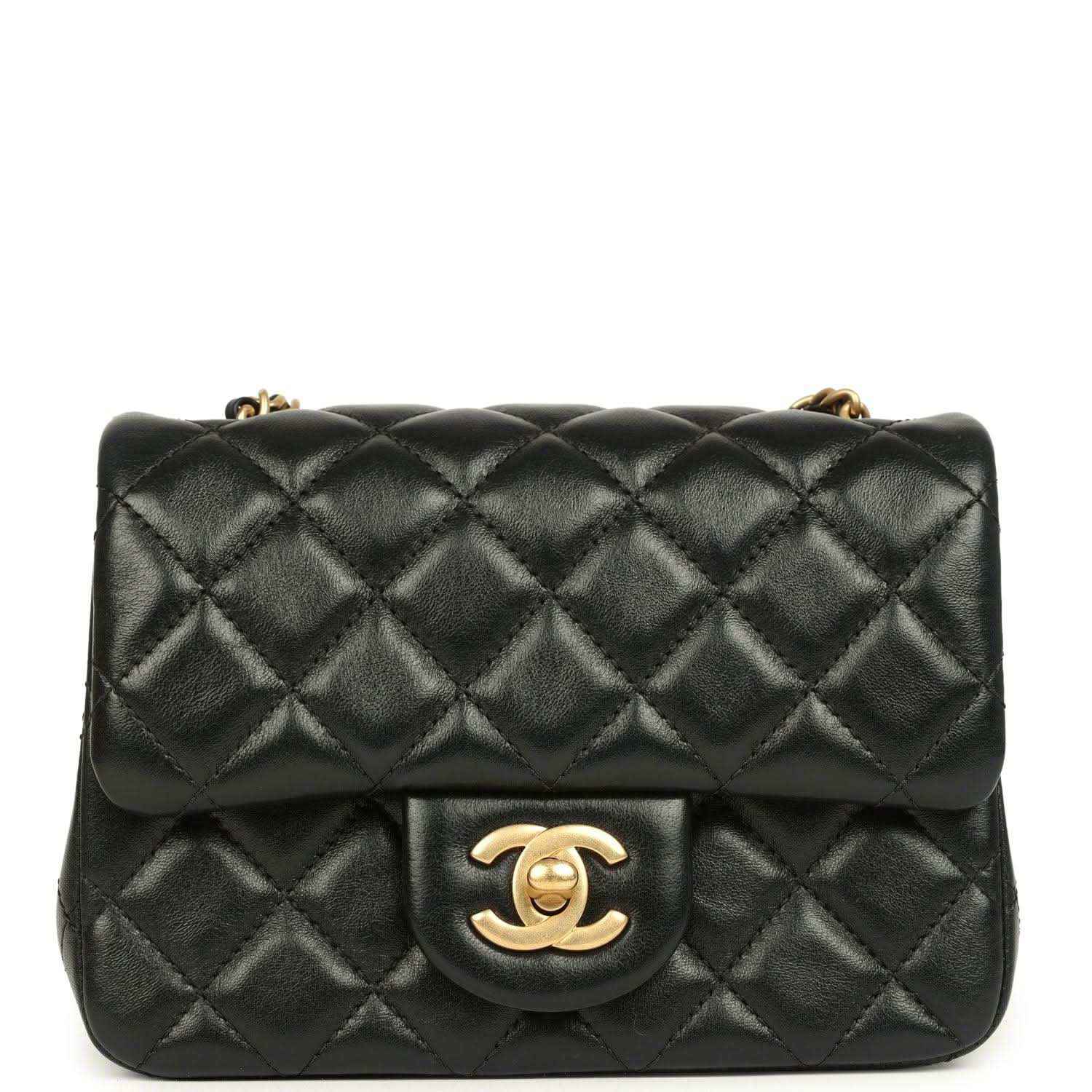 Black quilted mini flap bag with gold CC turn-lock and chain strap