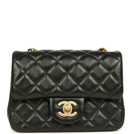 Black quilted mini flap bag with gold CC turn-lock and chain strap