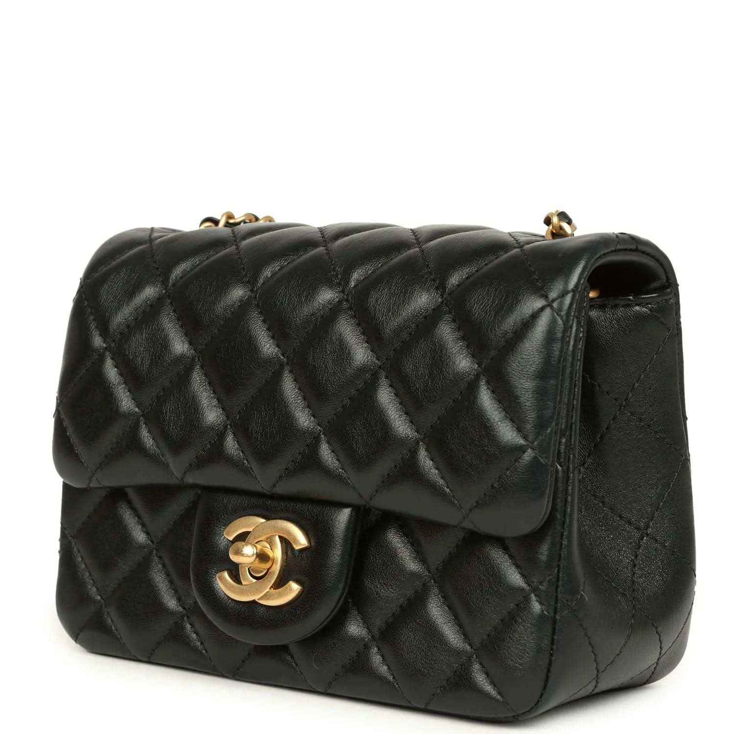 Black quilted mini flap bag with gold CC clasp and structured frame