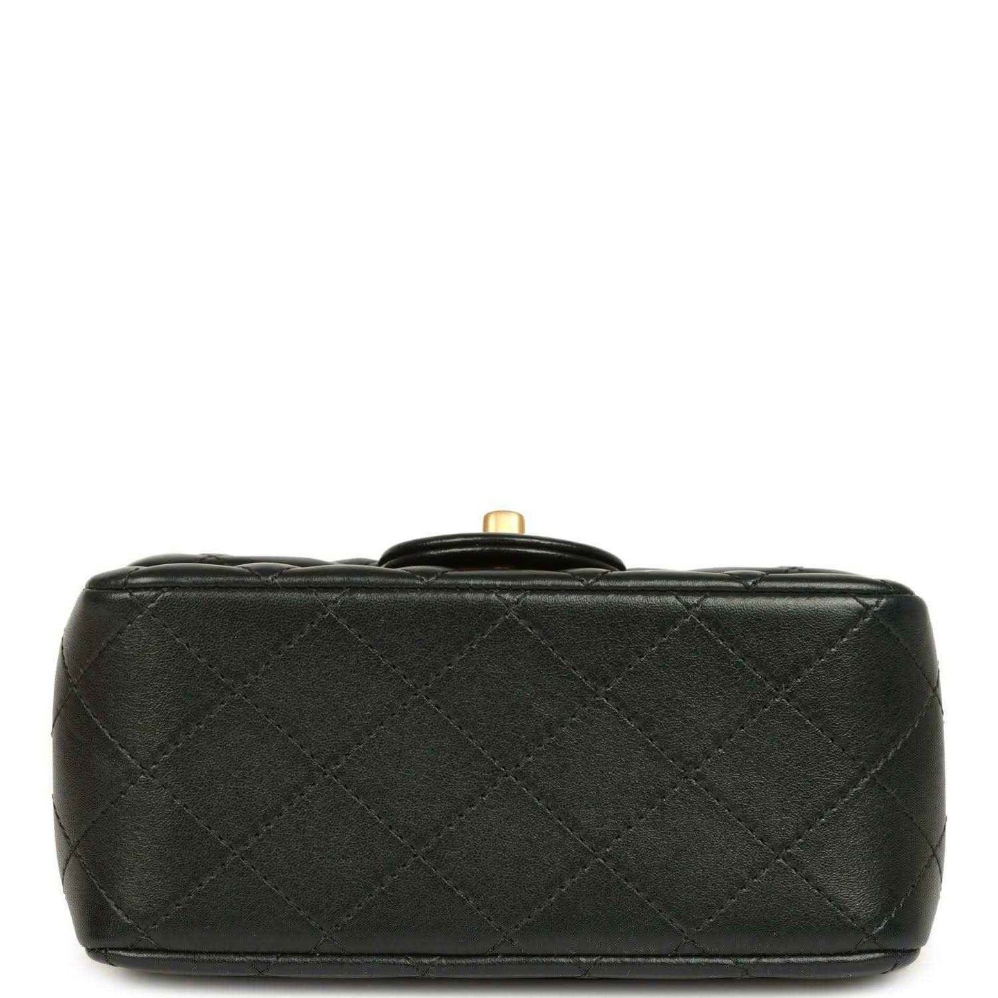 Black quilted mini flap bag bottom with gold-tone top hardware
