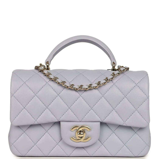 Mini rectangular flap bag in light purple quilted leather with gold-tone chain and CC clasp