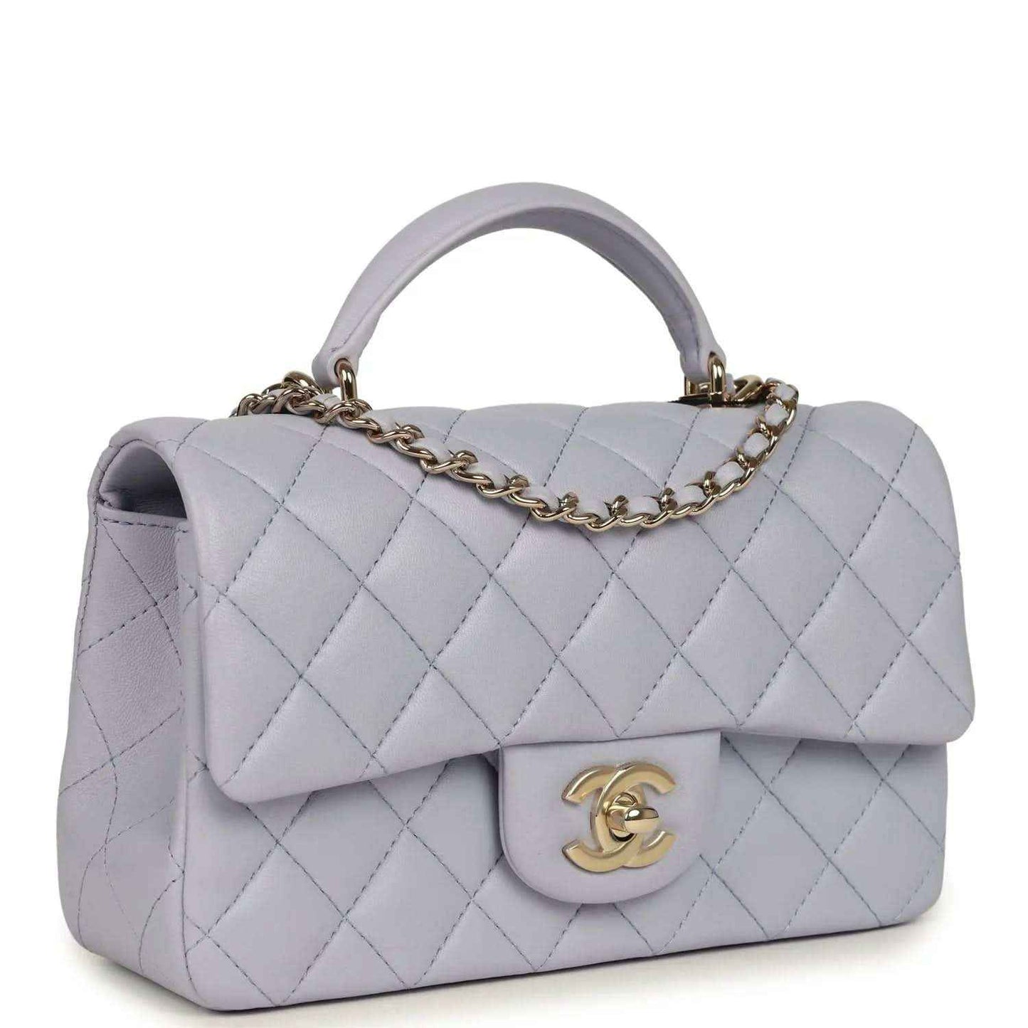 Mini rectangular flap bag in light purple quilted leather with gold-tone chain and front flap