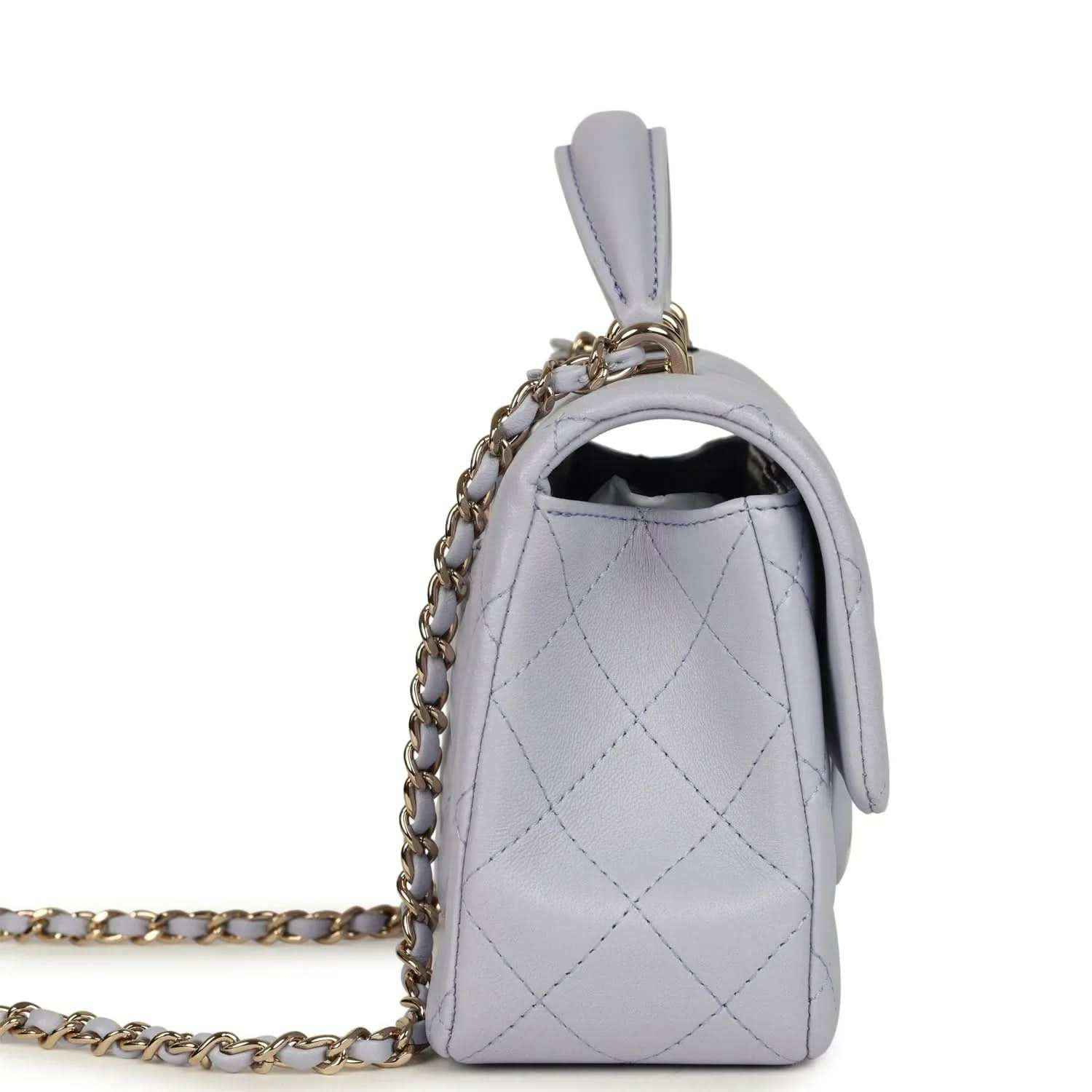 Mini rectangular flap bag side view in light purple quilted leather with chain strap