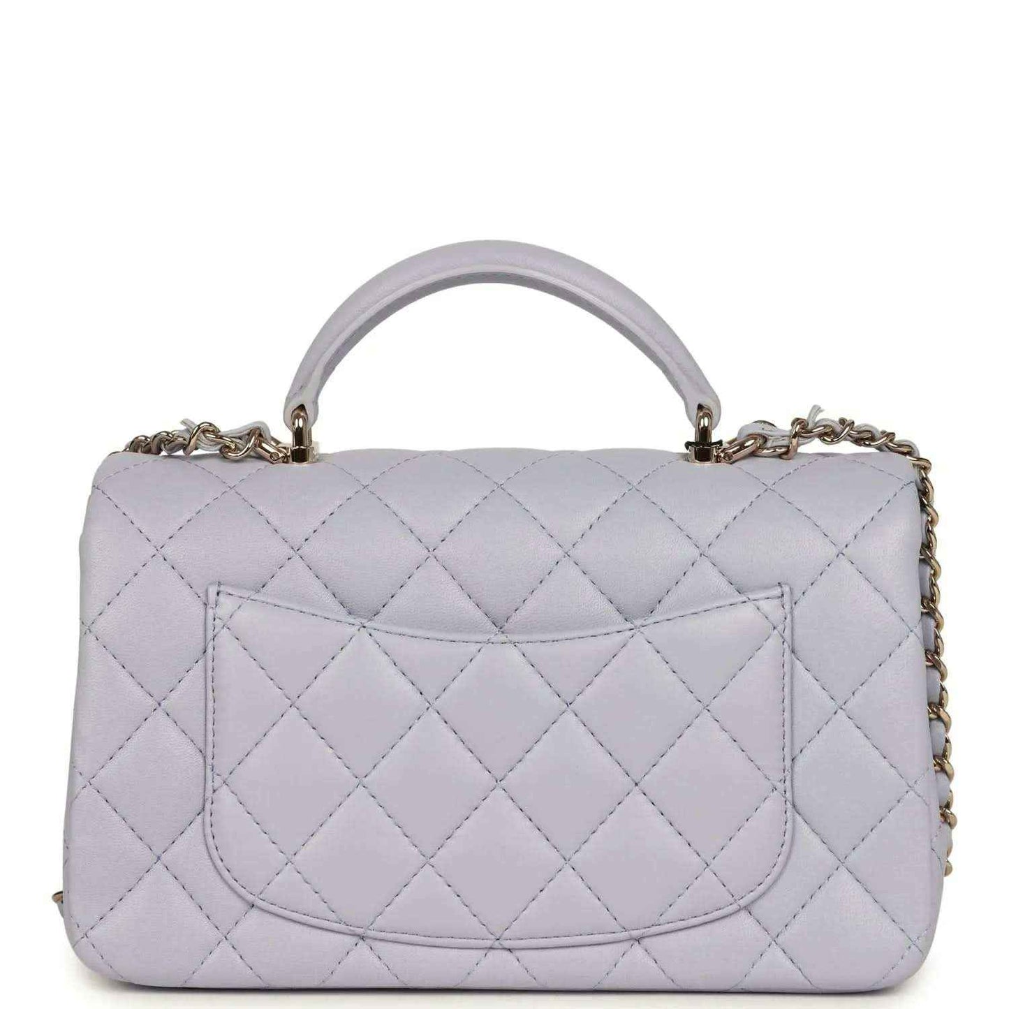 Mini rectangular flap bag in light purple quilted leather with snap clasp and top handle