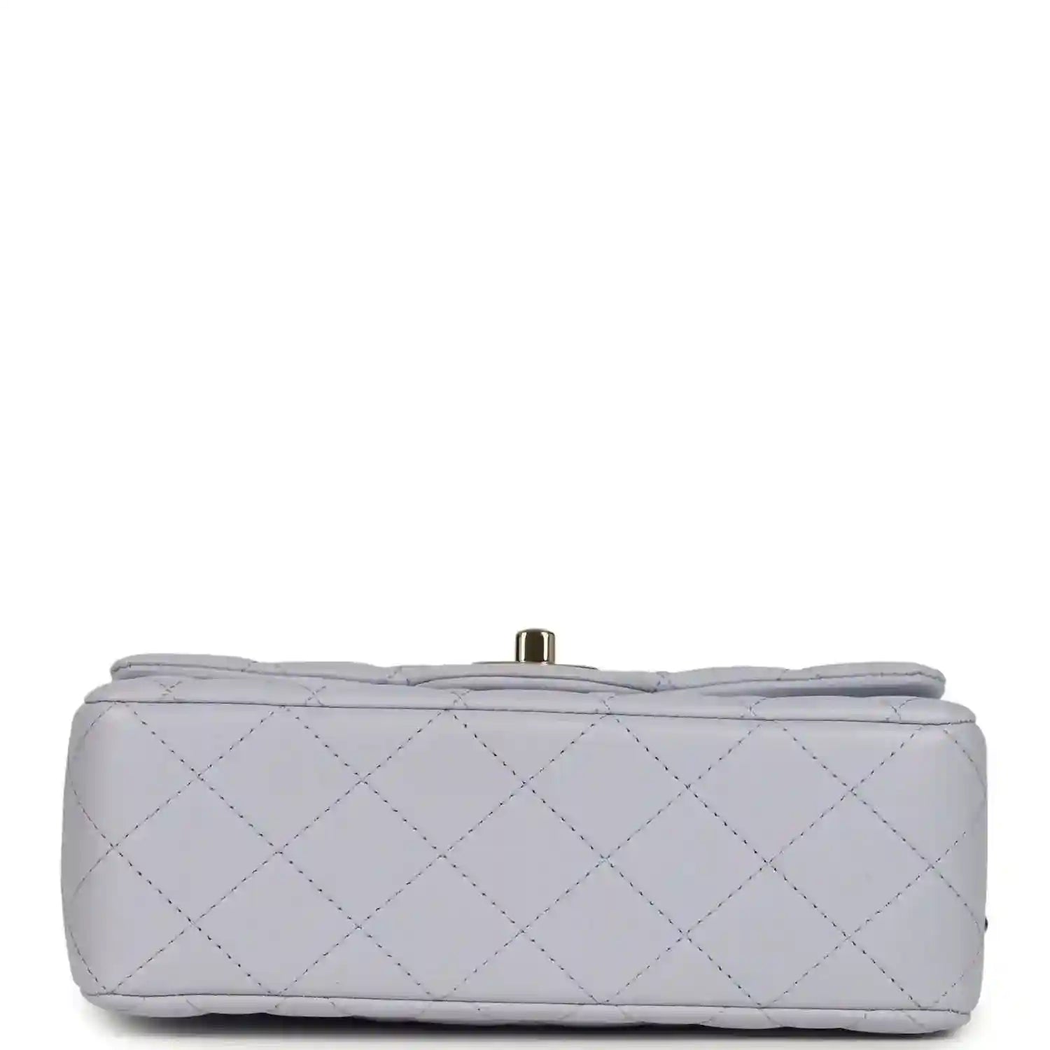 Mini rectangular flap bag back view in light purple quilted leather with small top bar