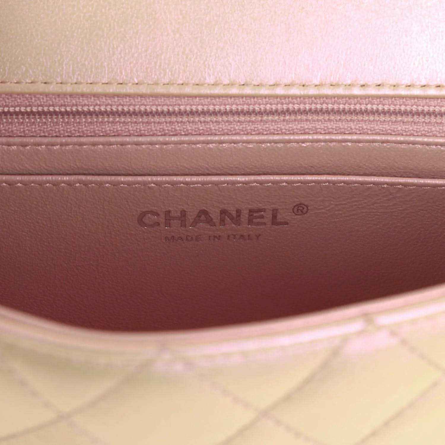 Chanel mini classic flap bag interior lining with CHANEL logo stamp