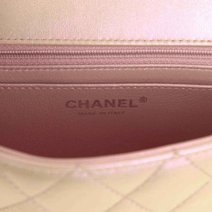 Chanel mini classic flap bag interior lining with CHANEL logo stamp