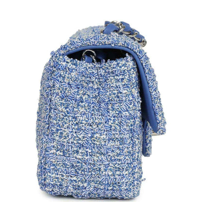 Blue and white tweed mini flap bag showing interior with chain strap and silver logo