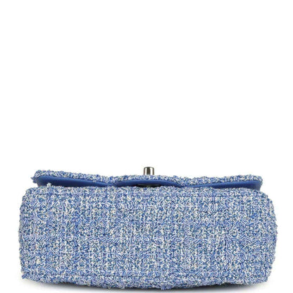 Blue and white tweed mini rectangular flap bag with top metal tab and chain strap