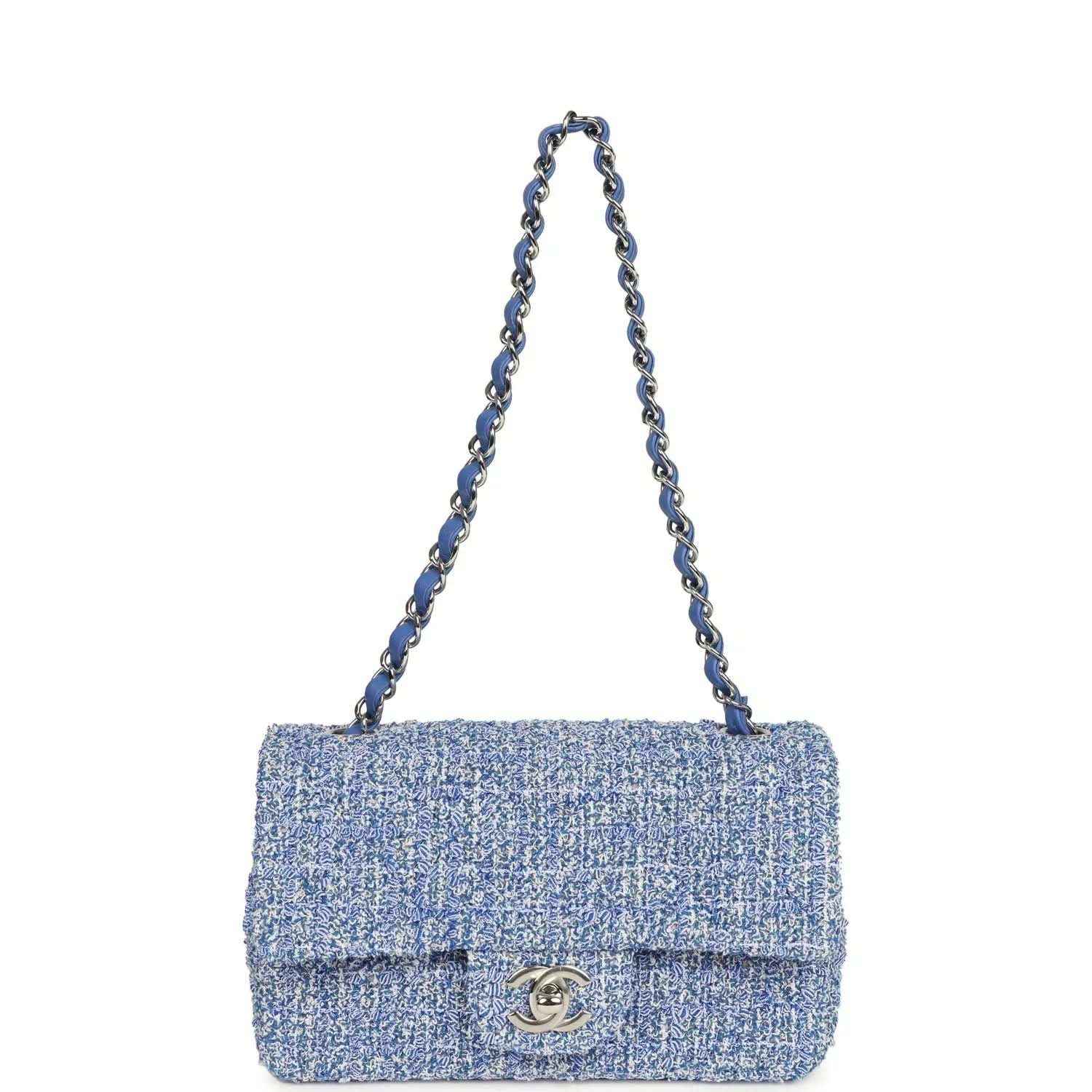 Blue and white tweed mini flap bag with chain strap and silver CC logo on front