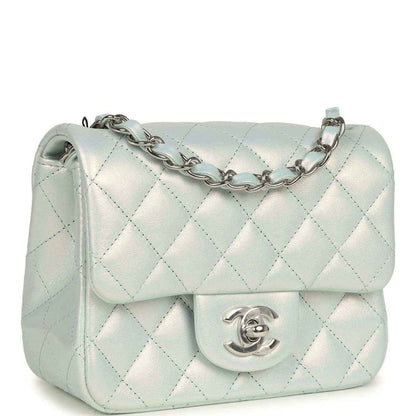 Mini square flap bag, iridescent light blue quilted leather, silver chain strap and turn-lock logo