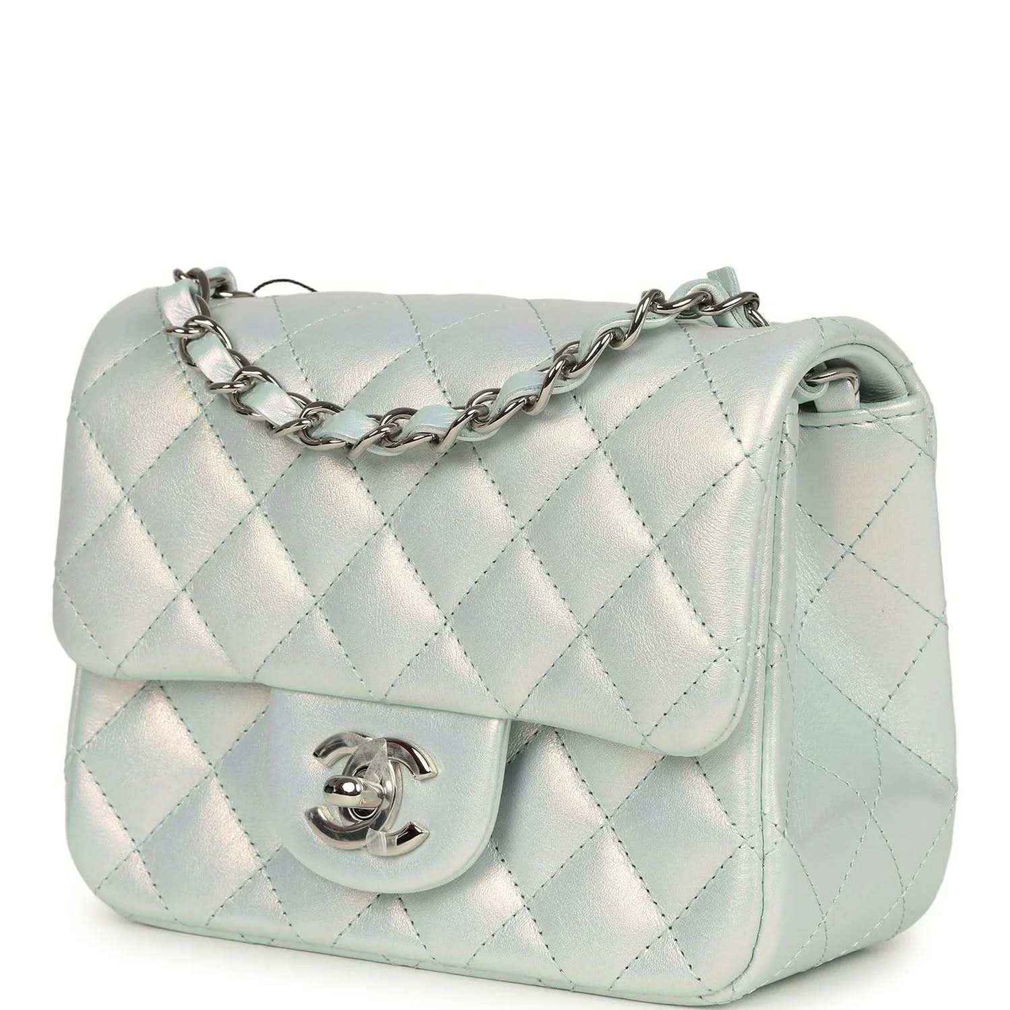 Mini square flap bag with iridescent light blue quilted body and silver CC turn-lock on front