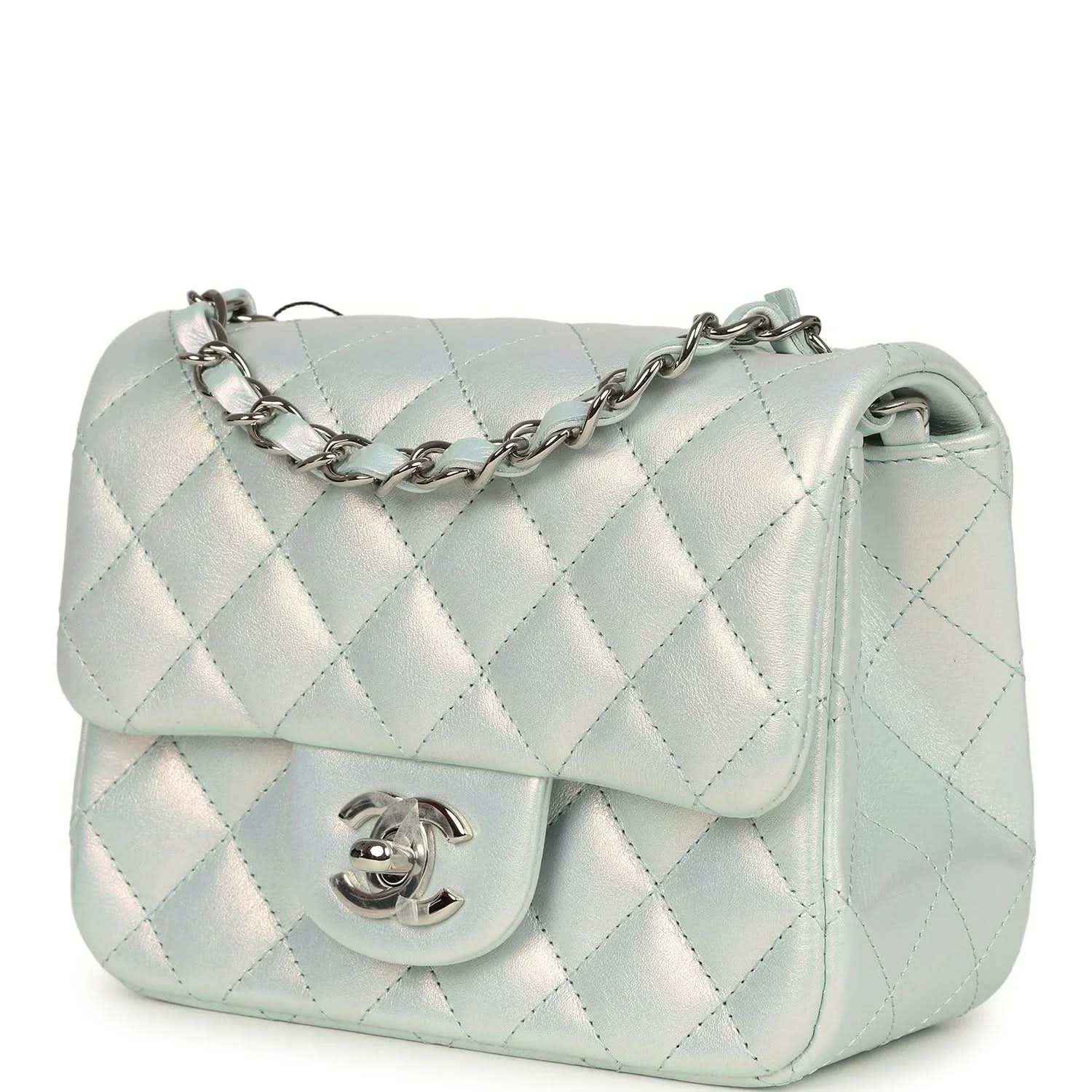 Mini square flap bag with iridescent light blue quilted body and silver CC turn-lock on front