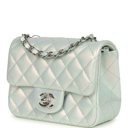 Mini square flap bag with iridescent light blue quilted body and silver CC turn-lock on front