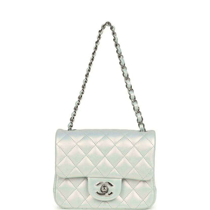 Mini square flap bag on chain in iridescent light blue quilted leather with CC logo front