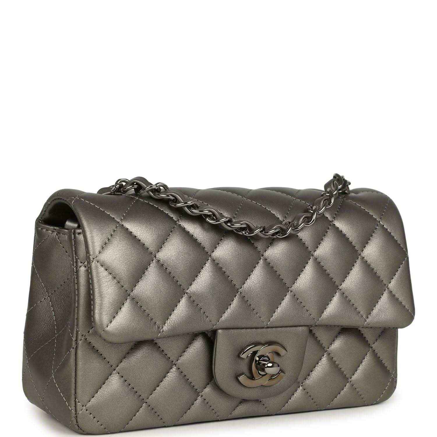 Silver quilted rectangular flap bag with chain strap and Chanel CC logo front