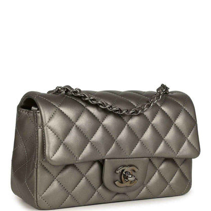 Silver quilted rectangular flap bag with chain strap and Chanel CC logo front