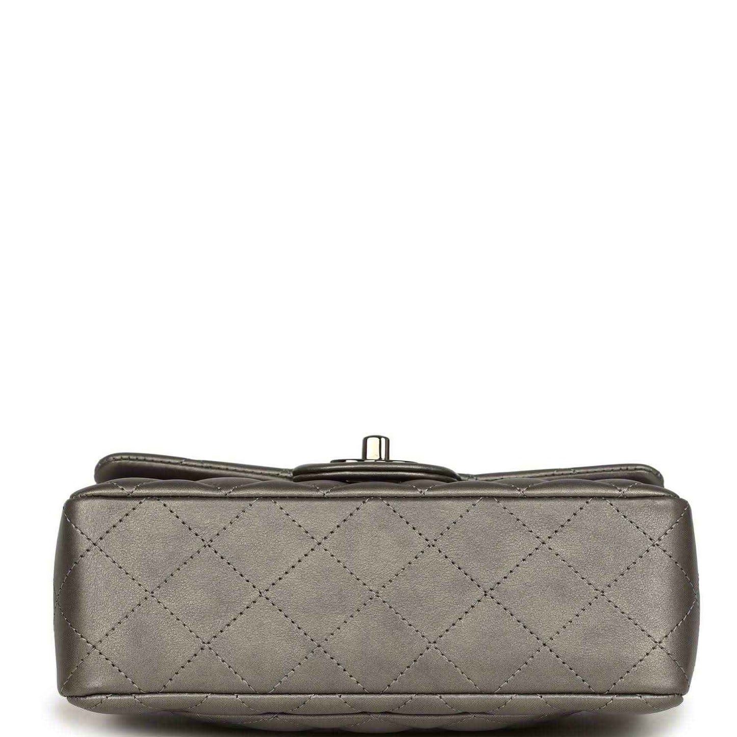 Silver quilted mini flap bag base with metal clasp and stitched edges