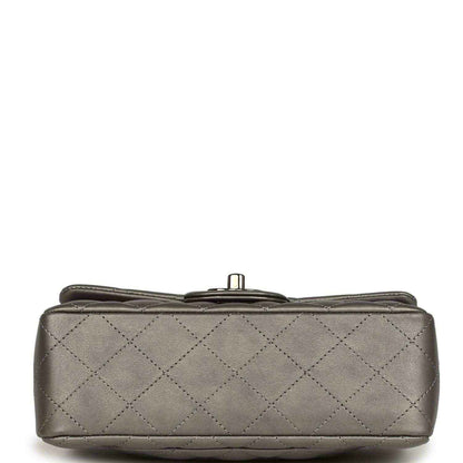 Silver quilted mini flap bag base with metal clasp and stitched edges