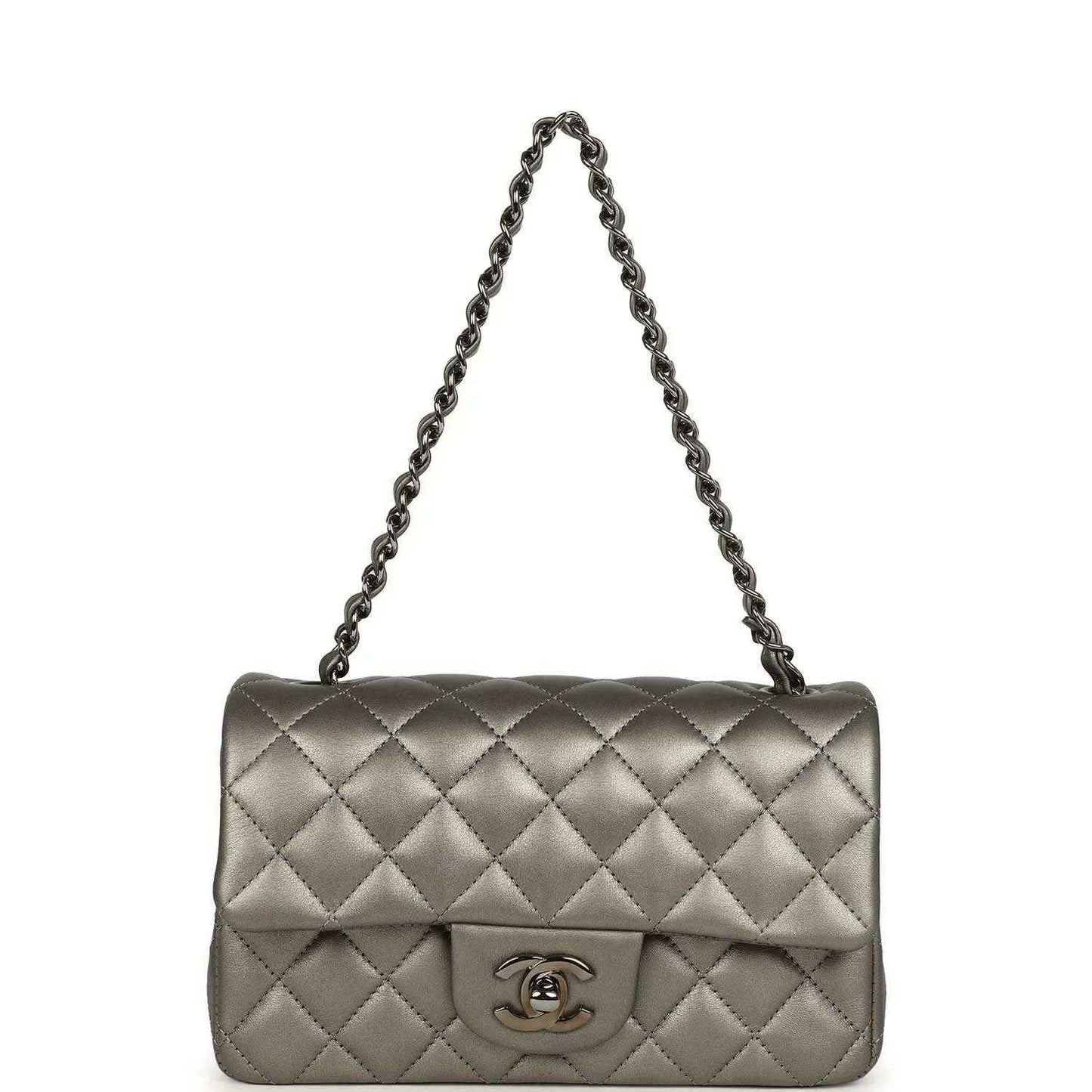 Silver quilted flap bag with chain strap and Chanel CC logo on front