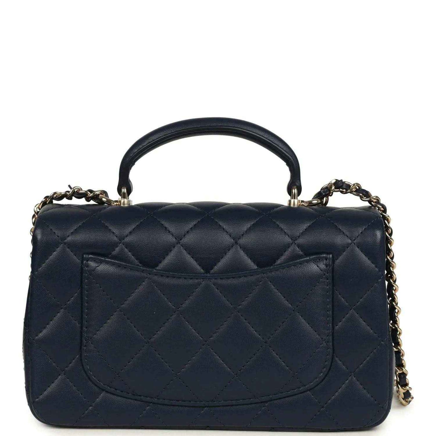 Navy quilted lambskin flap bag with gold-tone CC logo and front pocket panel