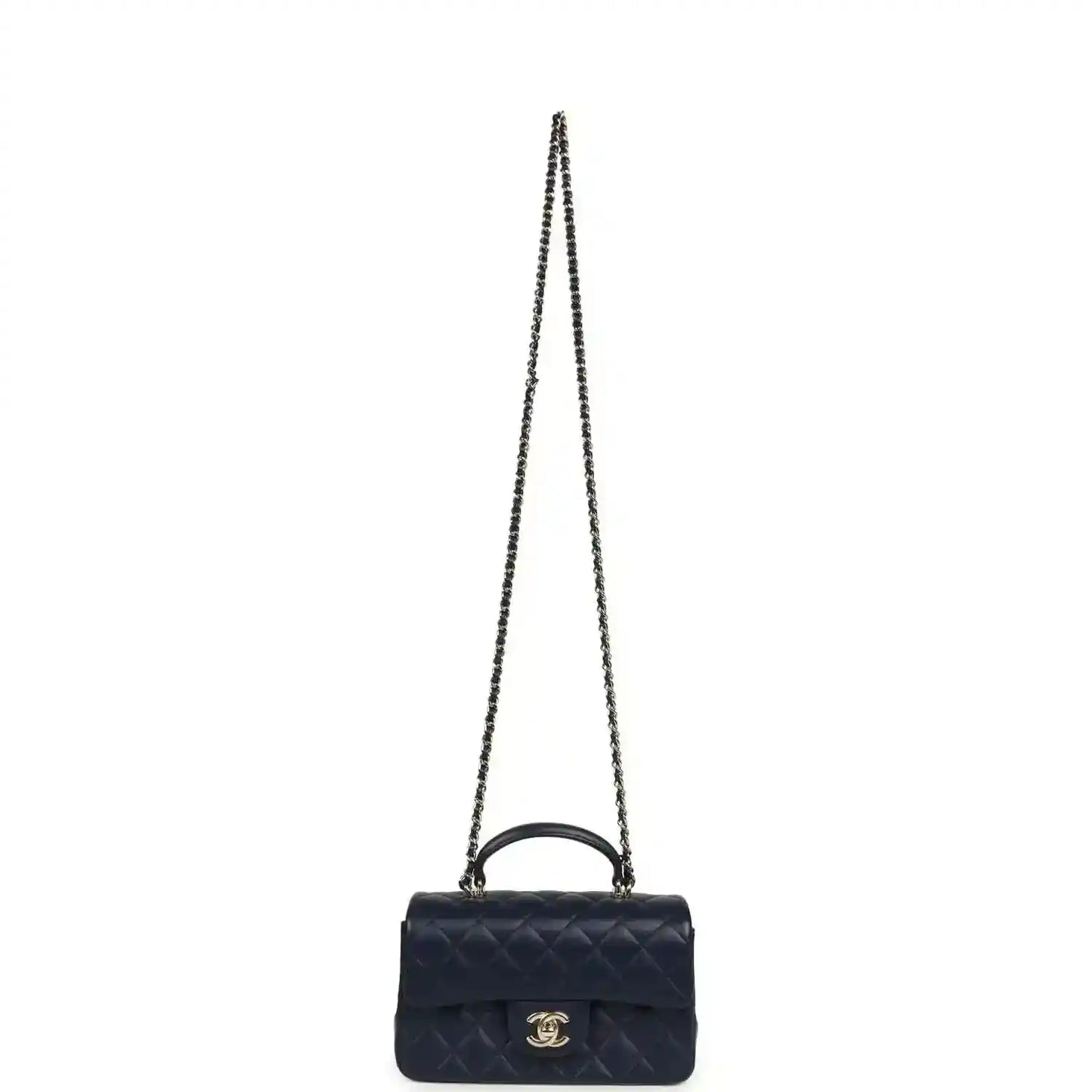 Navy mini crossbody flap bag with long chain strap and CC logo