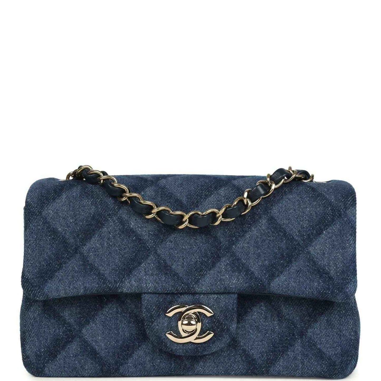 Chanel mini flap bag in blue denim with quilted pattern and gold chain strap