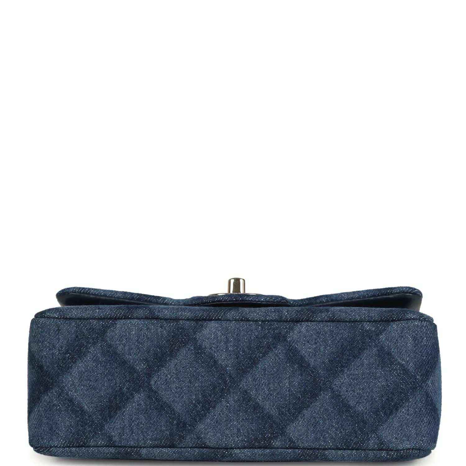 Chanel mini flap bag, bottom view, blue denim base with metal turn-lock