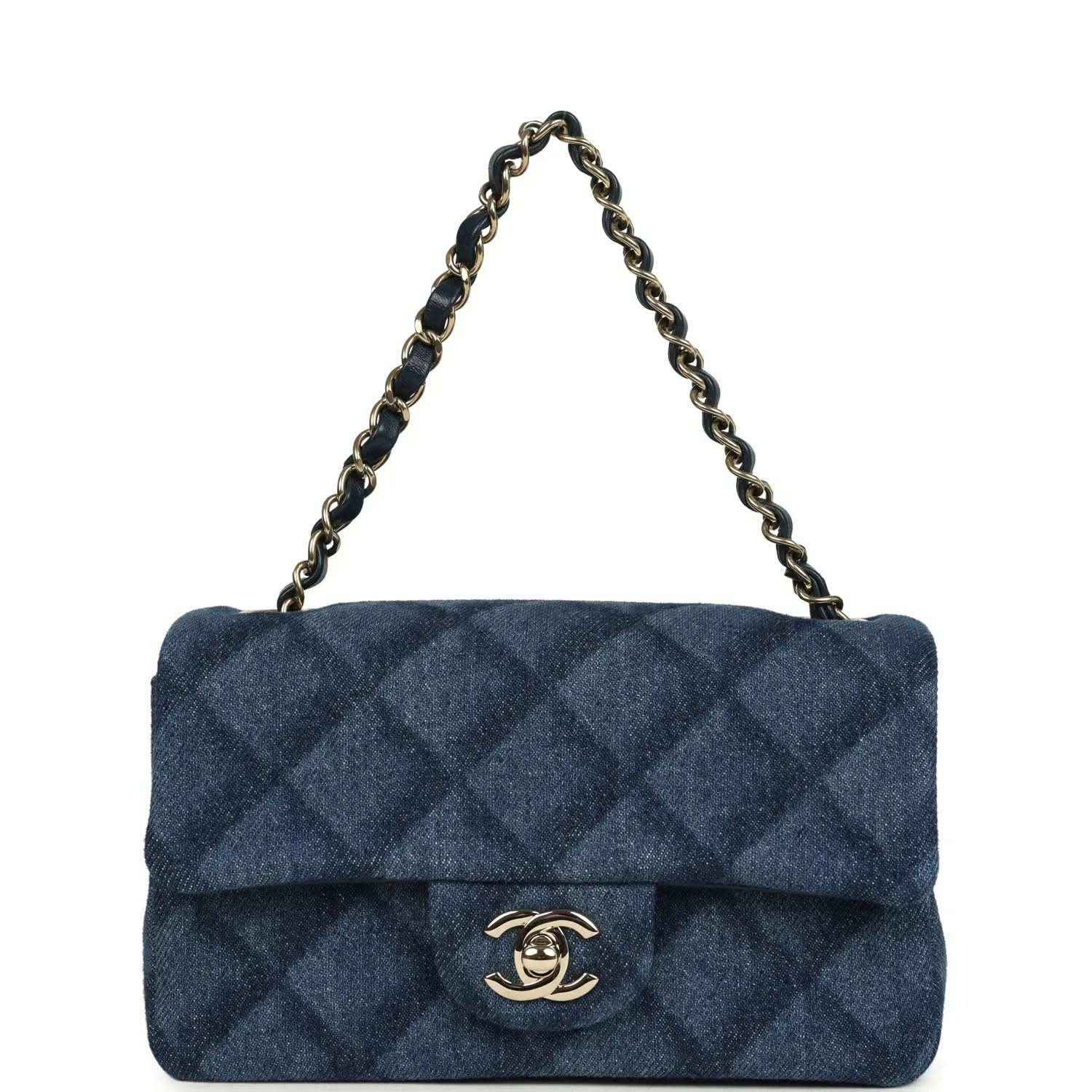 Chanel mini flap bag, front view with chain, blue denim and gold logo clasp
