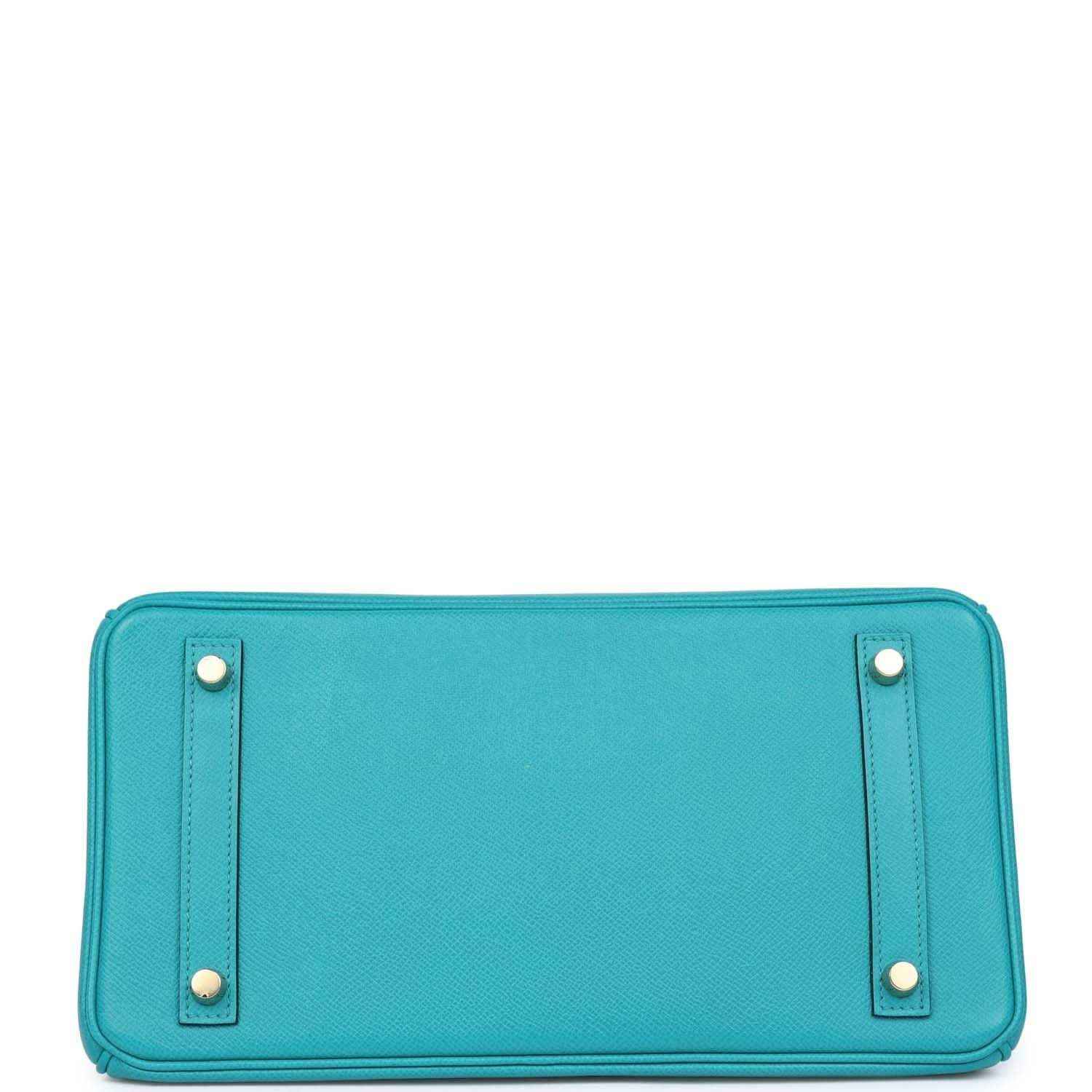 Blue peacock leather handbag base with gold corner studs and neat front panel stitching
