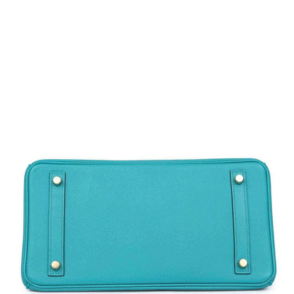Blue peacock leather handbag base with gold corner studs and neat front panel stitching