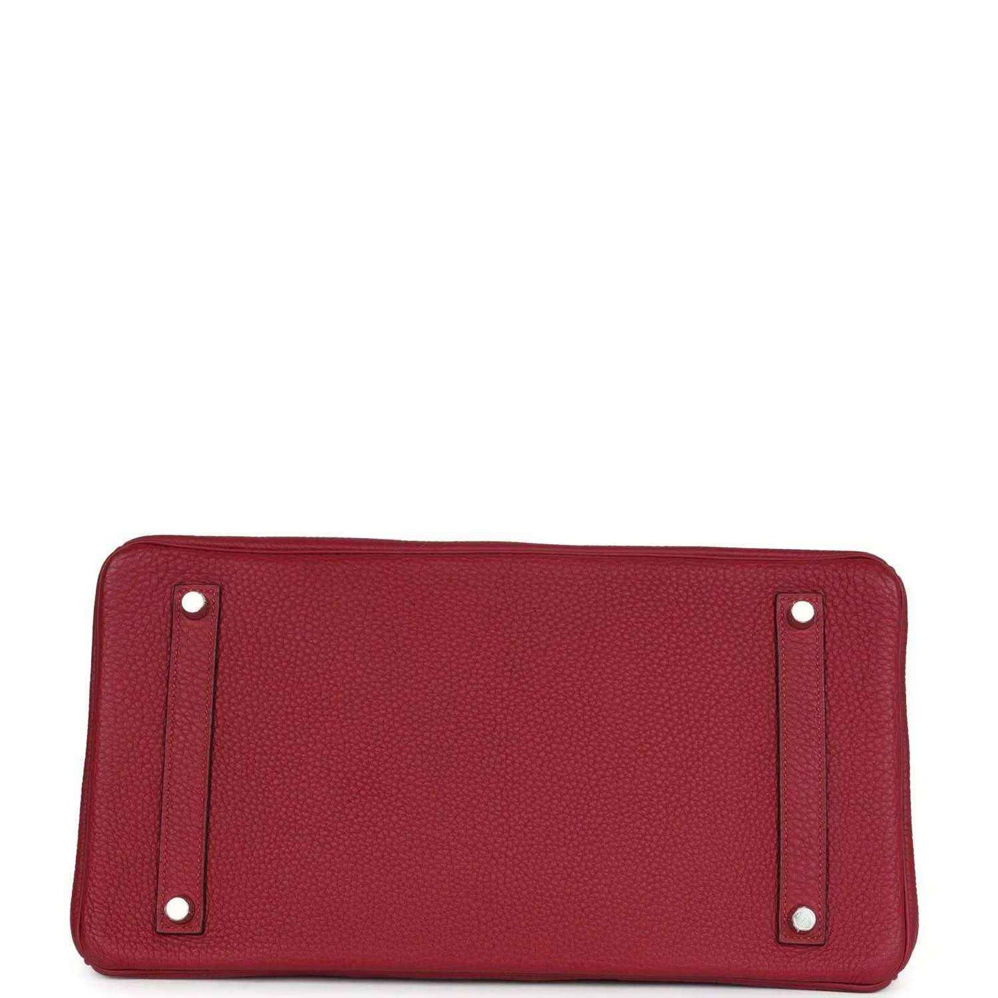 Red leather handbag base with rounded corners and metal feet on the bottom panel