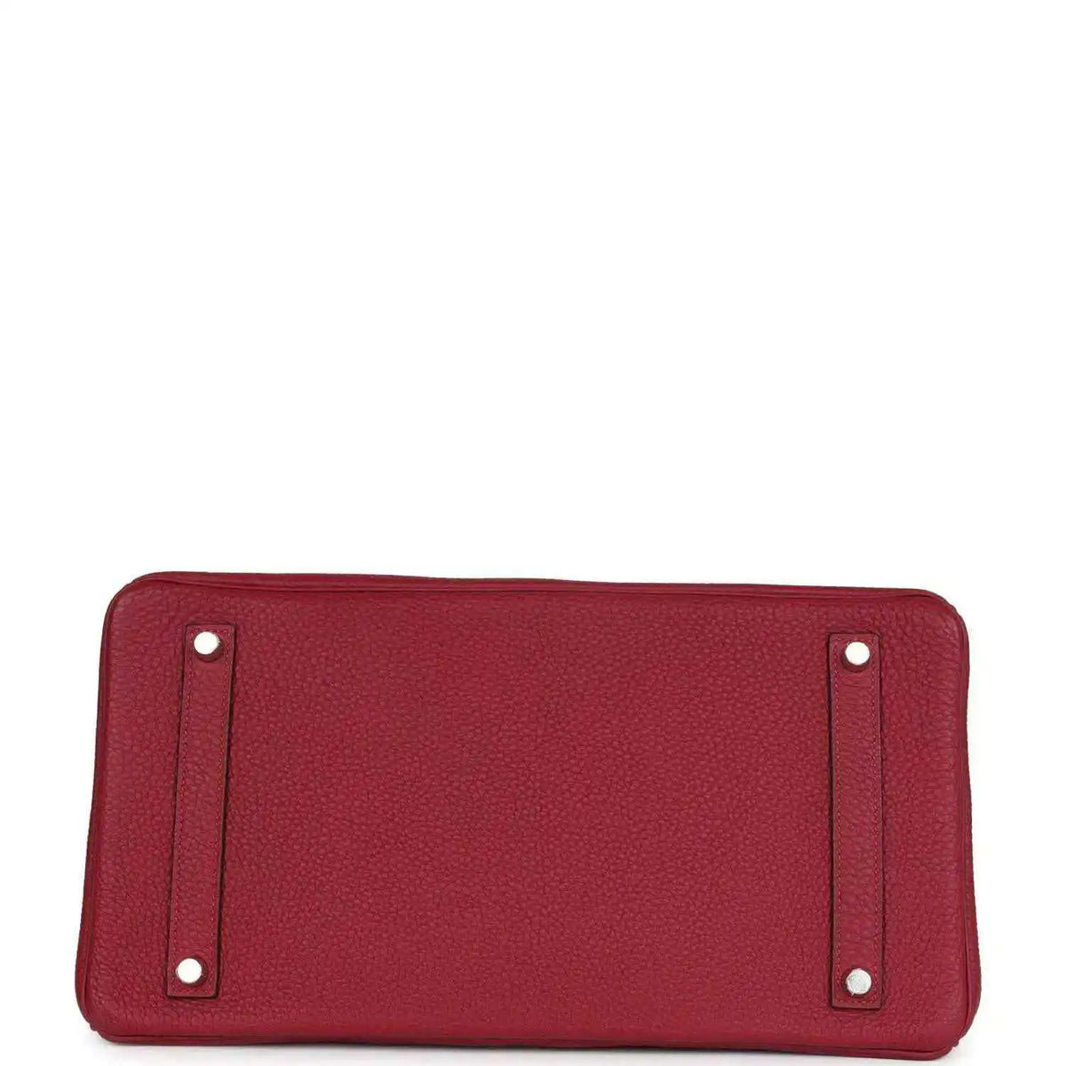 Red leather handbag base with rounded corners and metal feet on the bottom panel