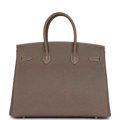 Hermes Birkin 35 taupe Togo leather handbag with front flap, bar details and top handles