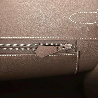 Hermes Birkin 35 taupe Togo leather interior with zip track and small leather zipper pull