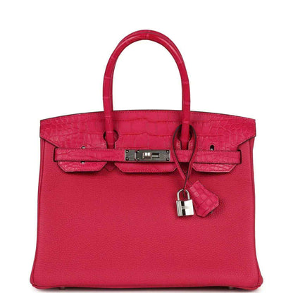 Pink Birkin handbag with front flap, lock charm, and polished hardware.