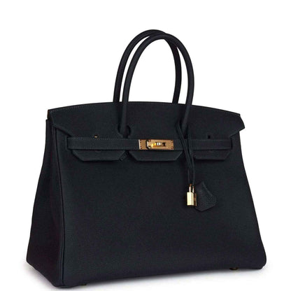 Leather Birkin handbag with gold front clasp and hanging lock charm, dark color