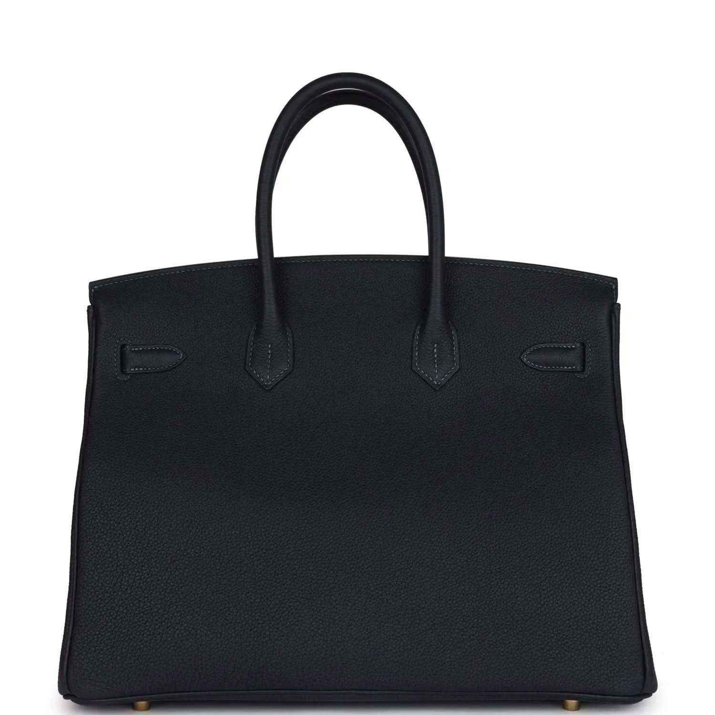Leather Birkin handbag front with structured flap, handles, and minimal gold accents, dark
