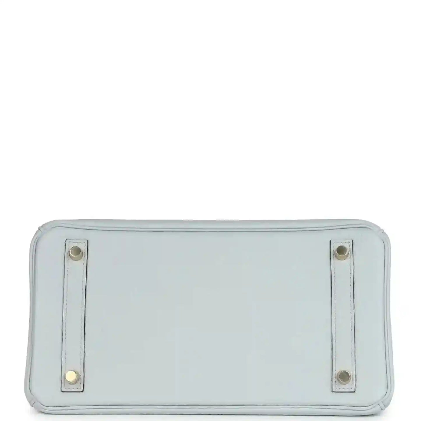 Pale blue leather handbag back panel with two metal corner tabs and stitching