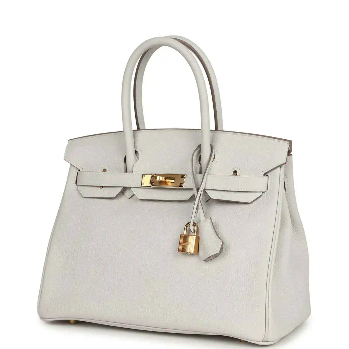 Light gray leather handbag with gold front clasp, top handles, hanging lock charm
