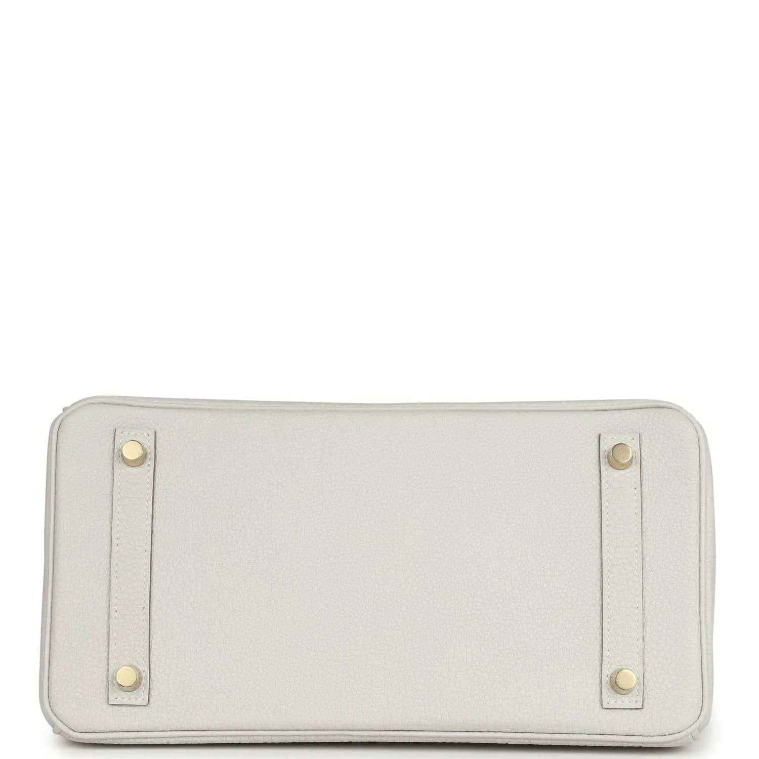 Light gray leather pouch panel with four corner studs and zip opening