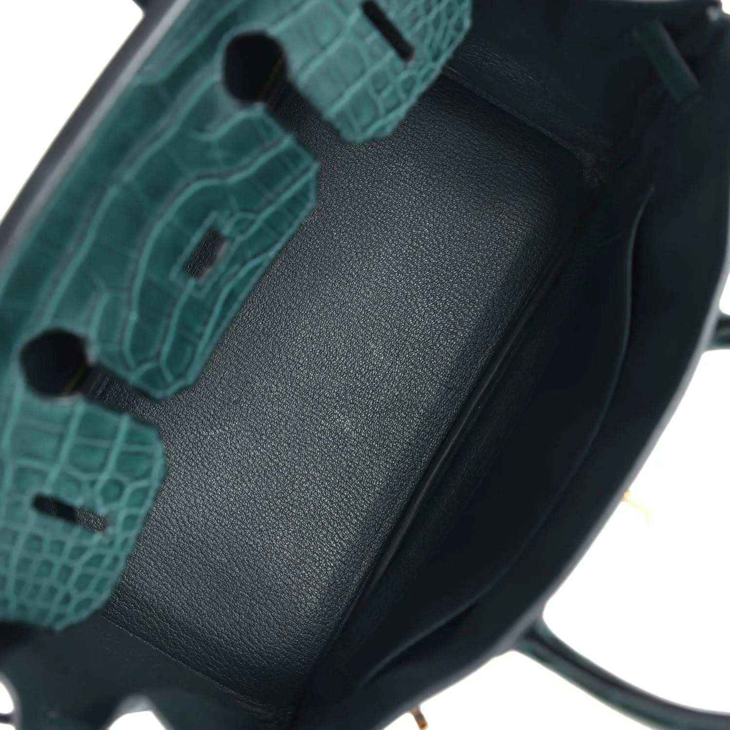 Birkin handbag interior lining detail in dark green with textured insert