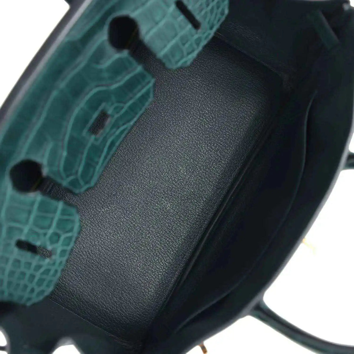 Birkin handbag interior lining detail in dark green with textured insert