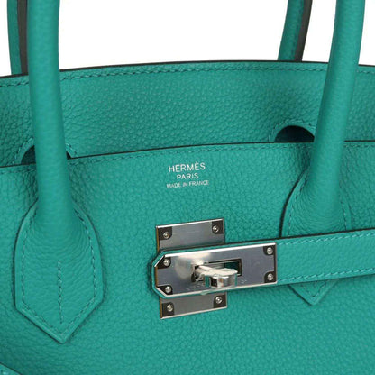 Hermes Birkin 30 teal leather handbag close-up of metal front clasp hardware