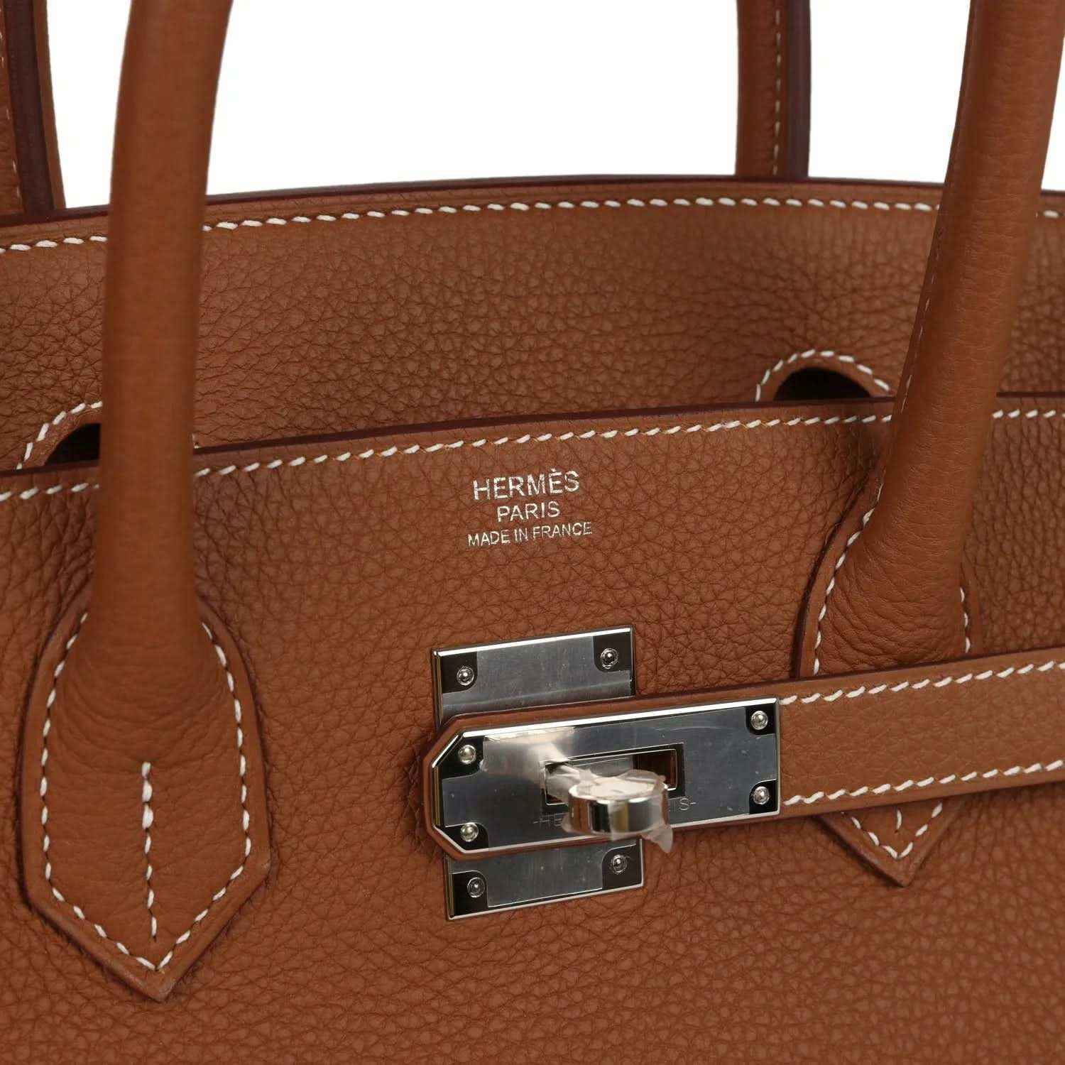 Hermes Birkin 30 handbag close-up of front flap hardware with Hermès Paris stamp and stitching