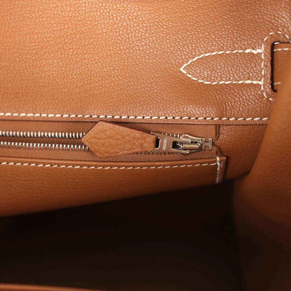 Hermes Birkin 30 handbag close-up of zipper track and leather tab with palladium hardware