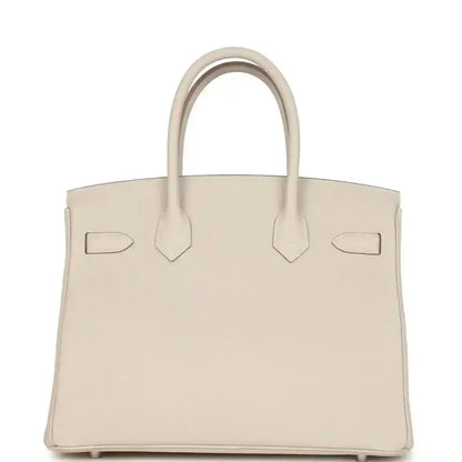 Birkin 30 handbag in light cream with twin handles and front patch pockets