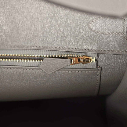 Hermes Birkin 35 handbag close-up of zipper pull and stitching on interior