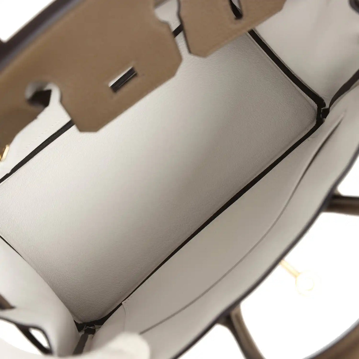 Hermes Birkin 25 handbag interior with light lining and structured compartments